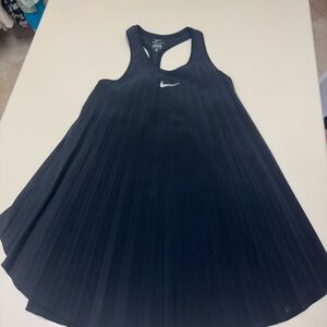 Nike pleated tennis dress with side slits.